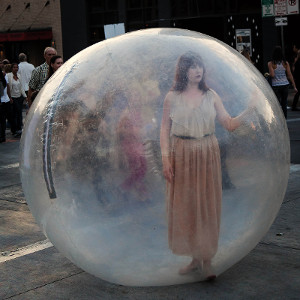 Girl in a large plastic bubble