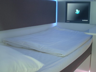Sleep pod interior, bed & TV